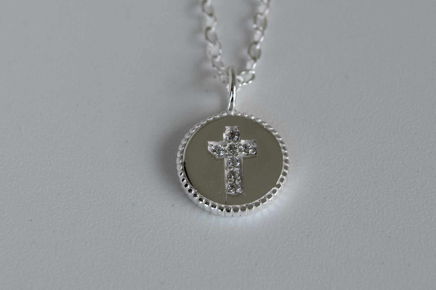 Sterling Silver CZ Cross In Disc Necklace