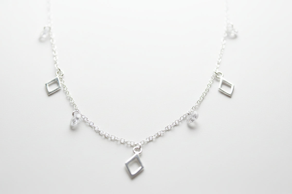 Sterling Silver Multi Open Diamond Shape Pendant And CZ Necklace