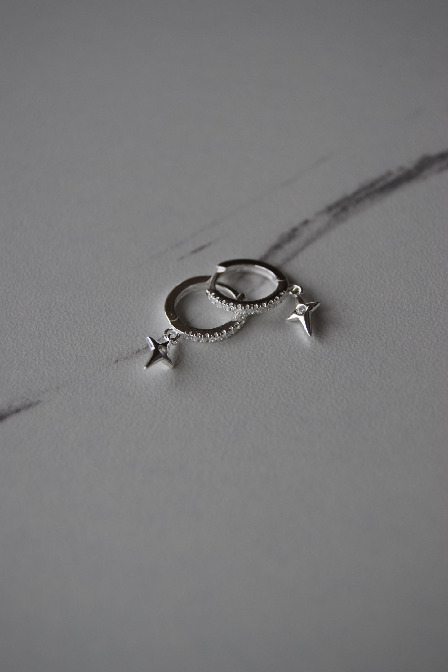 Sterling Silver CZ Huggie Earrings With Cross Pendant