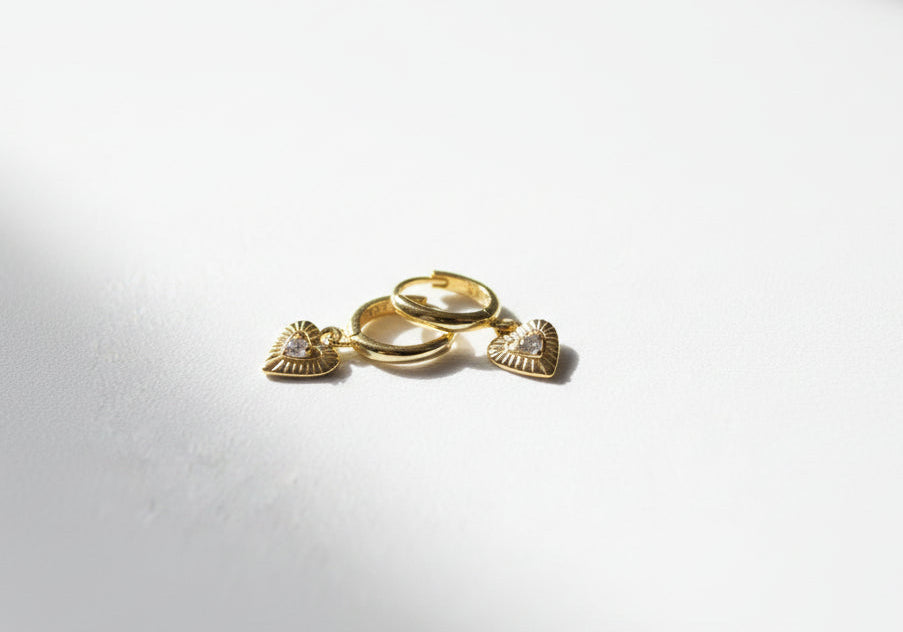 Gold Plated Huggies Earrings With Textured Heart Pendants