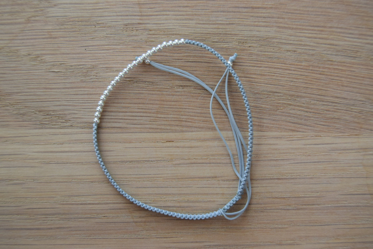 Ball Beads with Grey Adjustable Polyester Bracelet