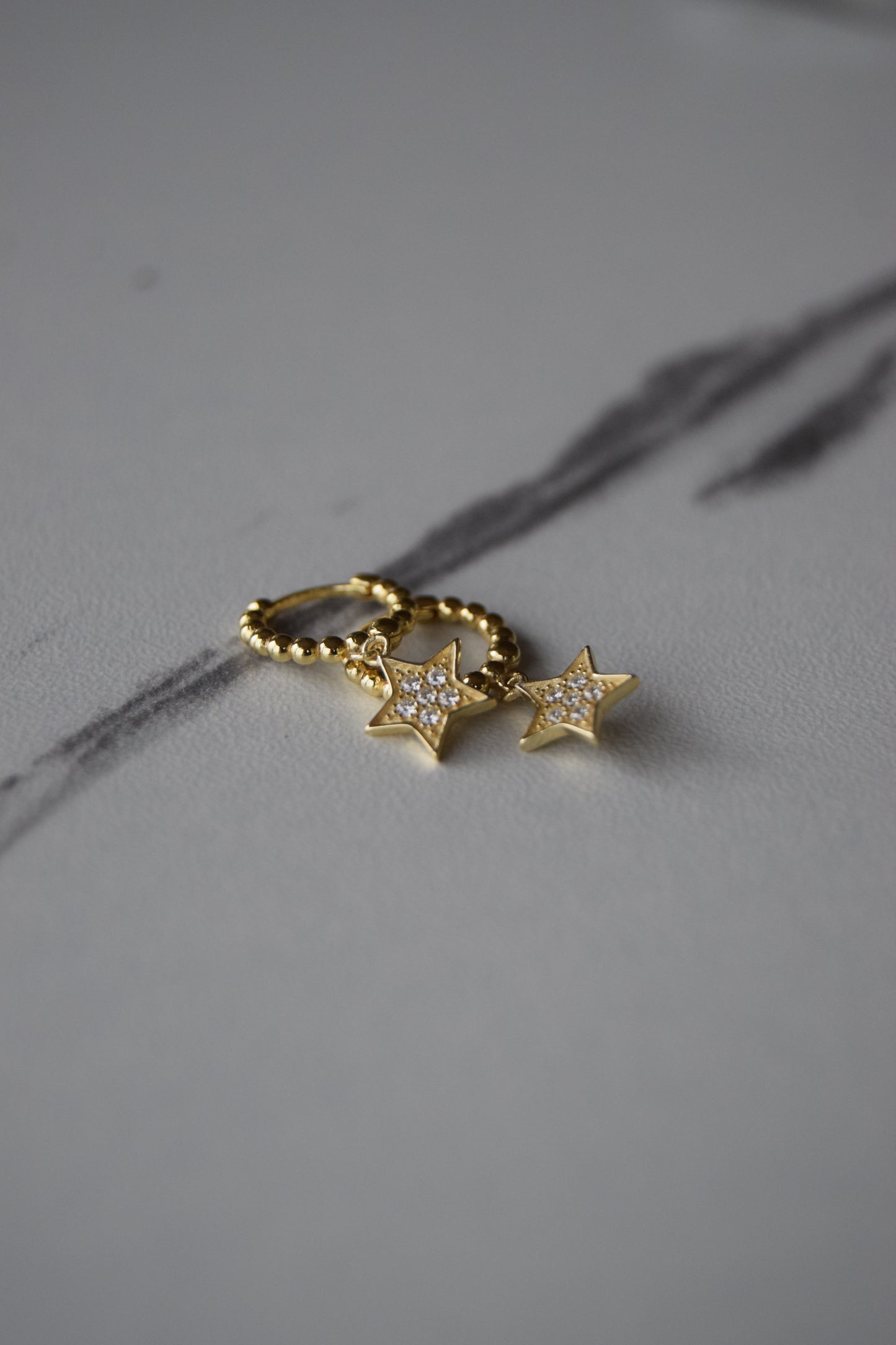 Gold Plated Huggie Earrings with CZ Star Pendant