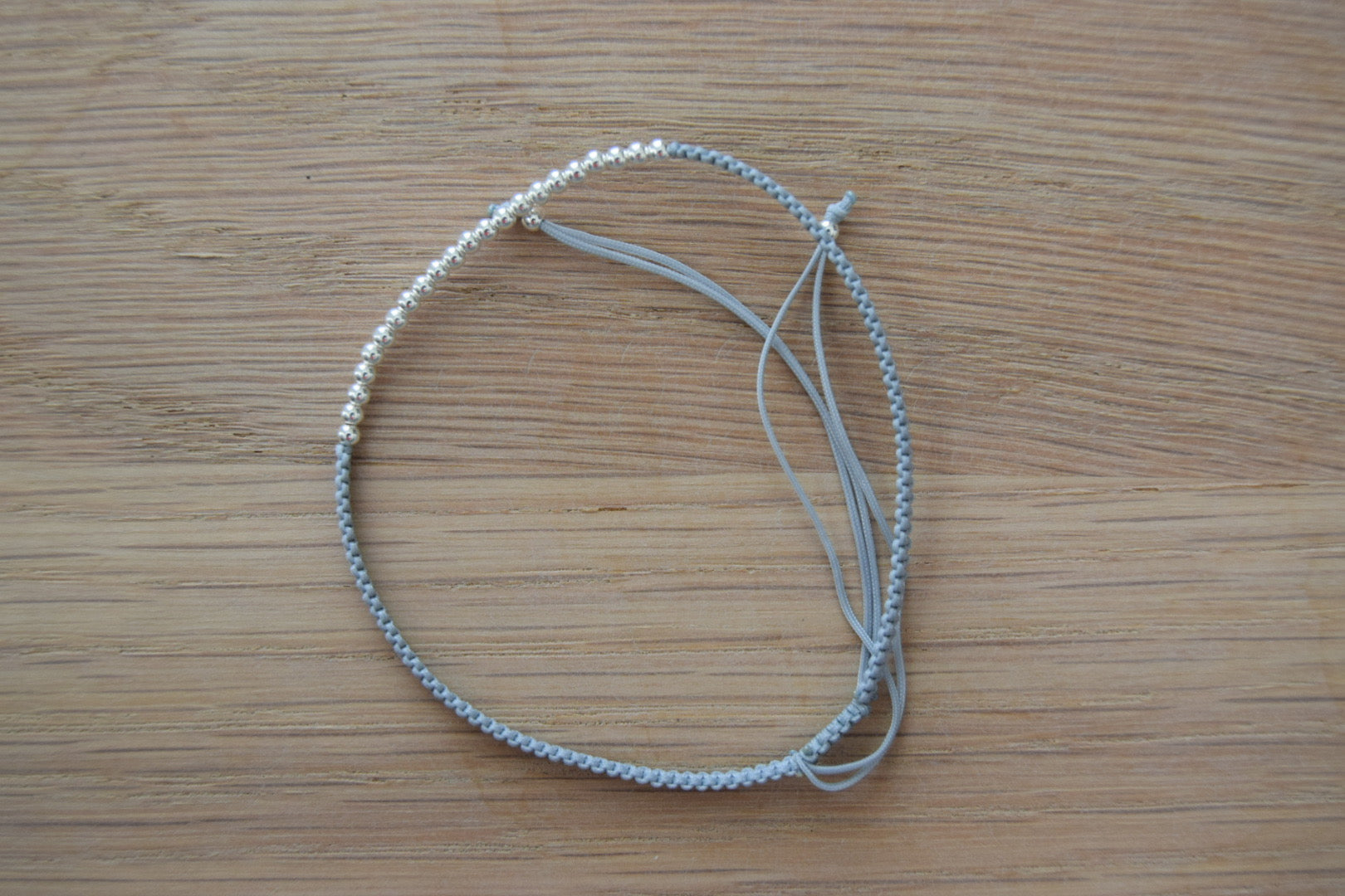 Ball Beads with Grey Adjustable Polyester Bracelet